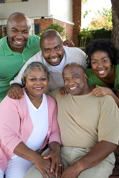 African American family smiling and posing for the camera